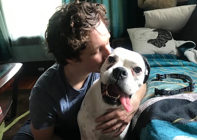 Canine kissing Portland's Malarkey
